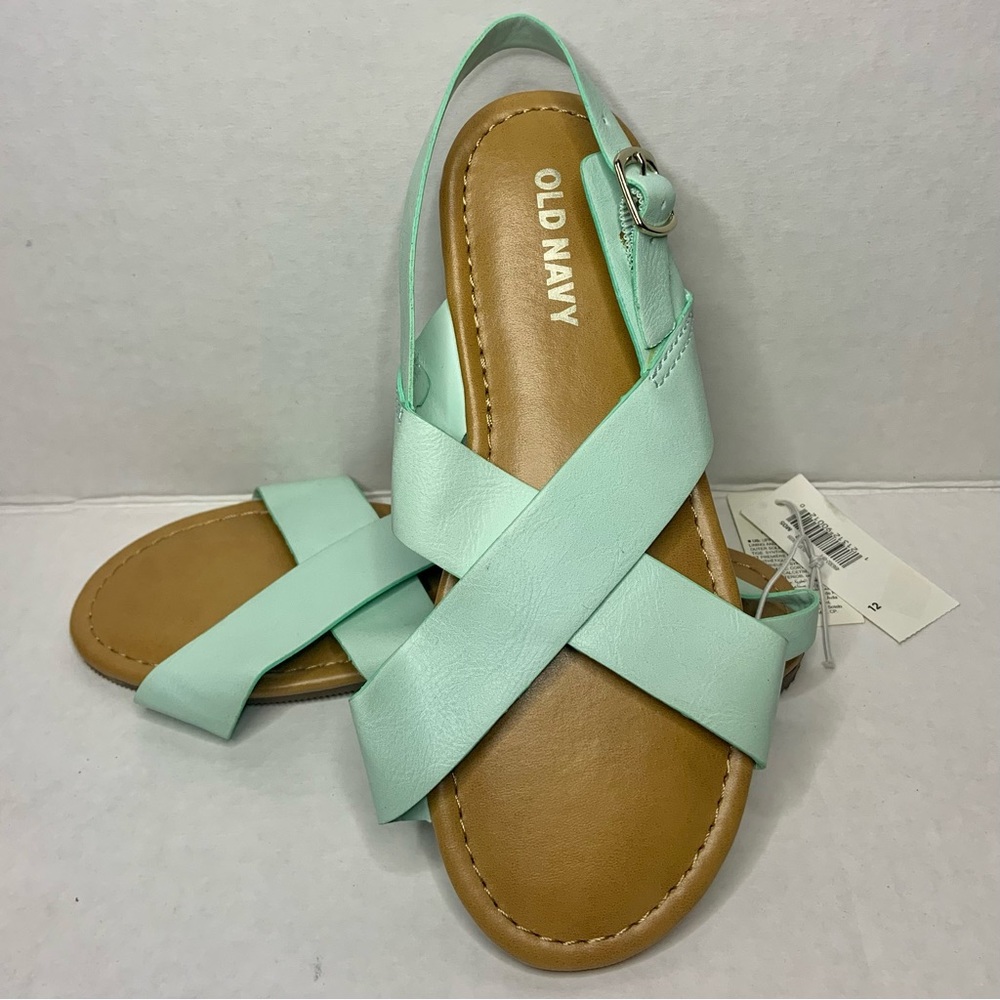 NWT turquoise cross cross slides